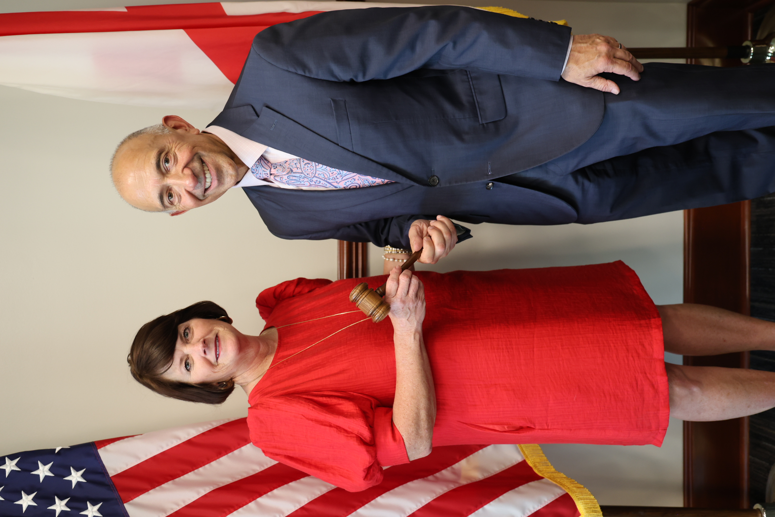 Mayor Sherry Sullivan of Fairhope accepts the president’s gavel from Mayor Mark Saliba of Dothan